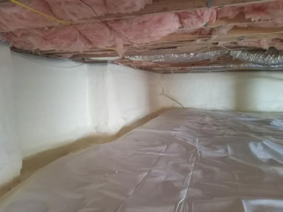 Crawl space encapsulation with closed-cell spray foam for Flat Roof Repair in Moultonborough